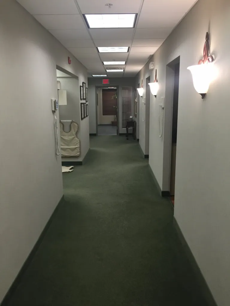 An image of the hallway that leads to the patient treatment rooms